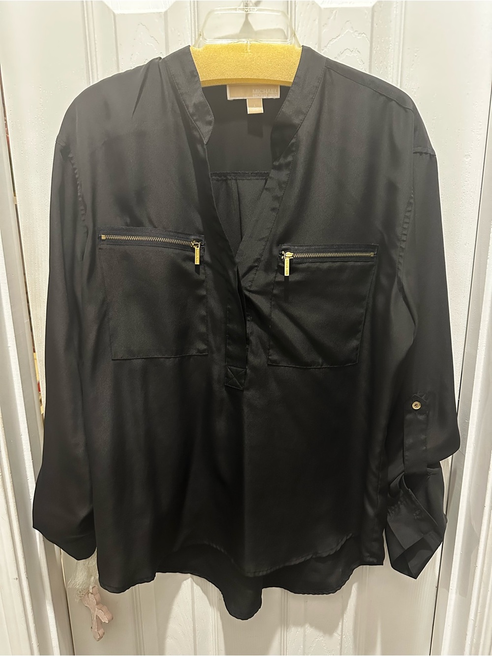 Michael Kors Women’s black shirt with gold zipper detailing